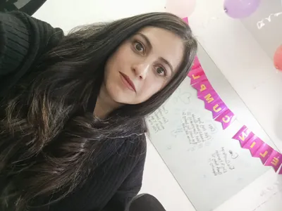 Portrait of Diana Carolina, operations manager of Infinity Bytes IT